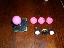 Un stick Sanwa JLF-TP et quelques boutons<br />Rose pour Sanwa | le reste en Seimitsu